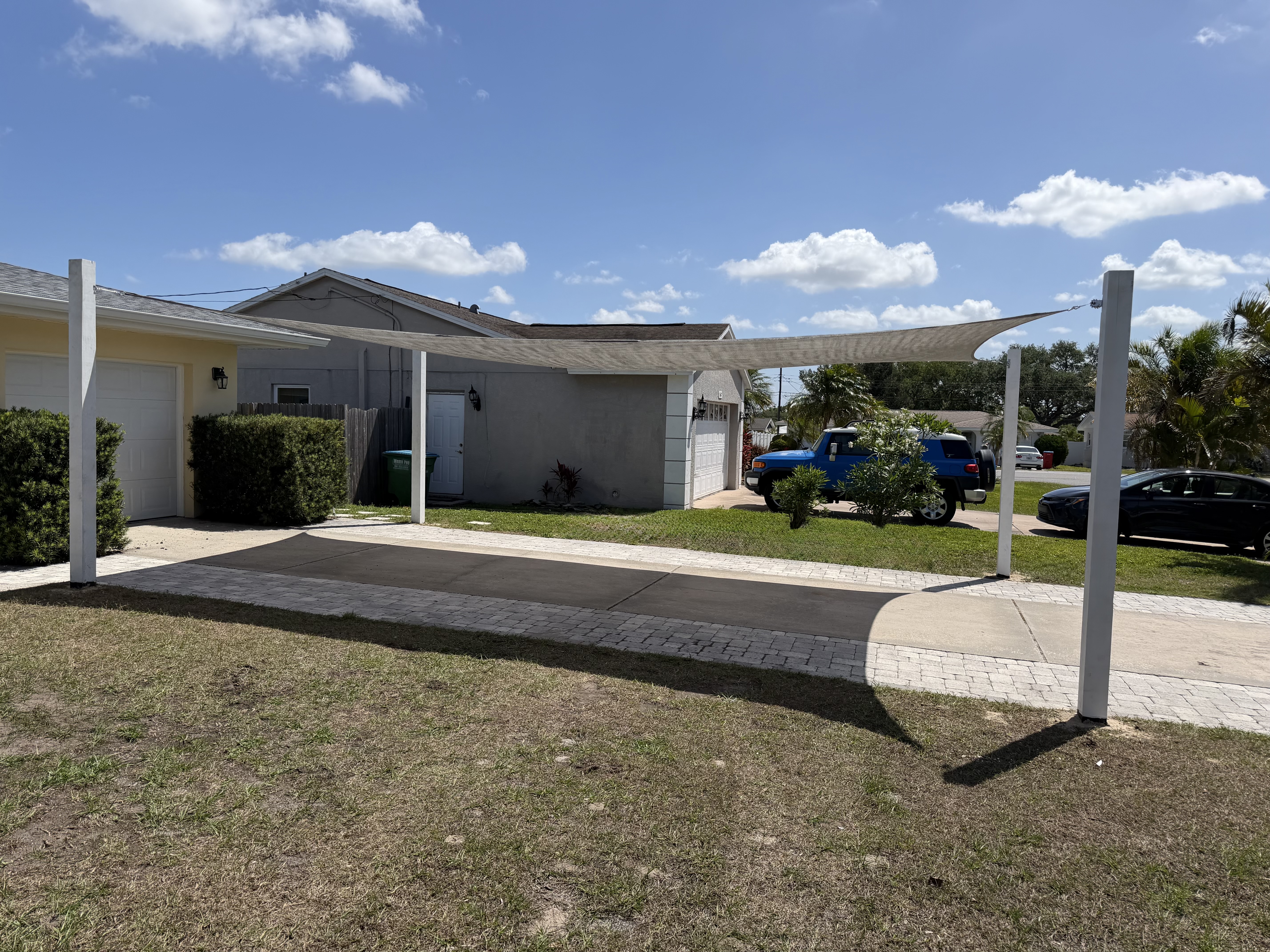 Wide driveway shade install